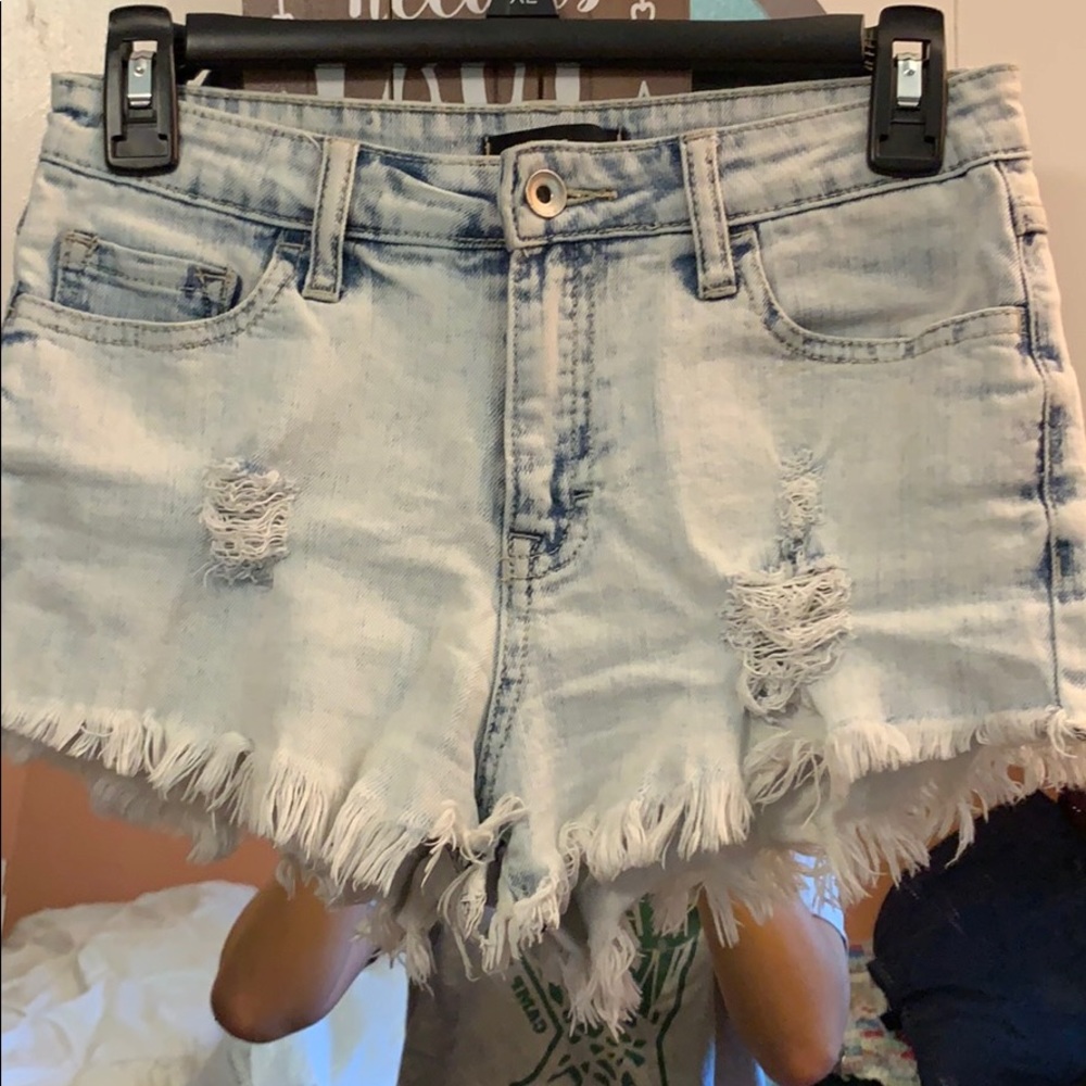Dry Goods mid rise, light wash shorts.